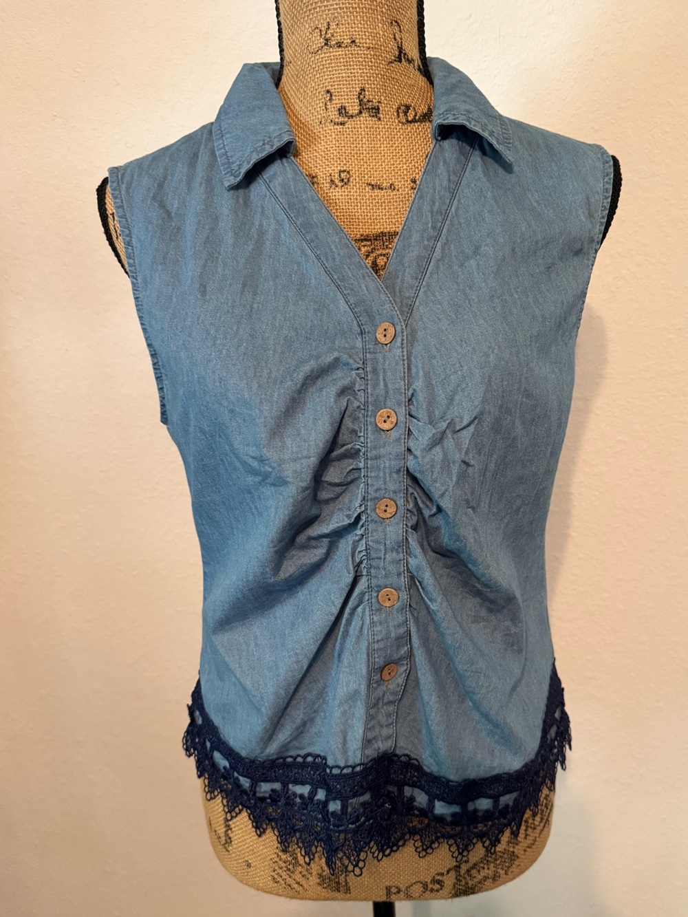 Blue sleeveless denim button-down blouse small
